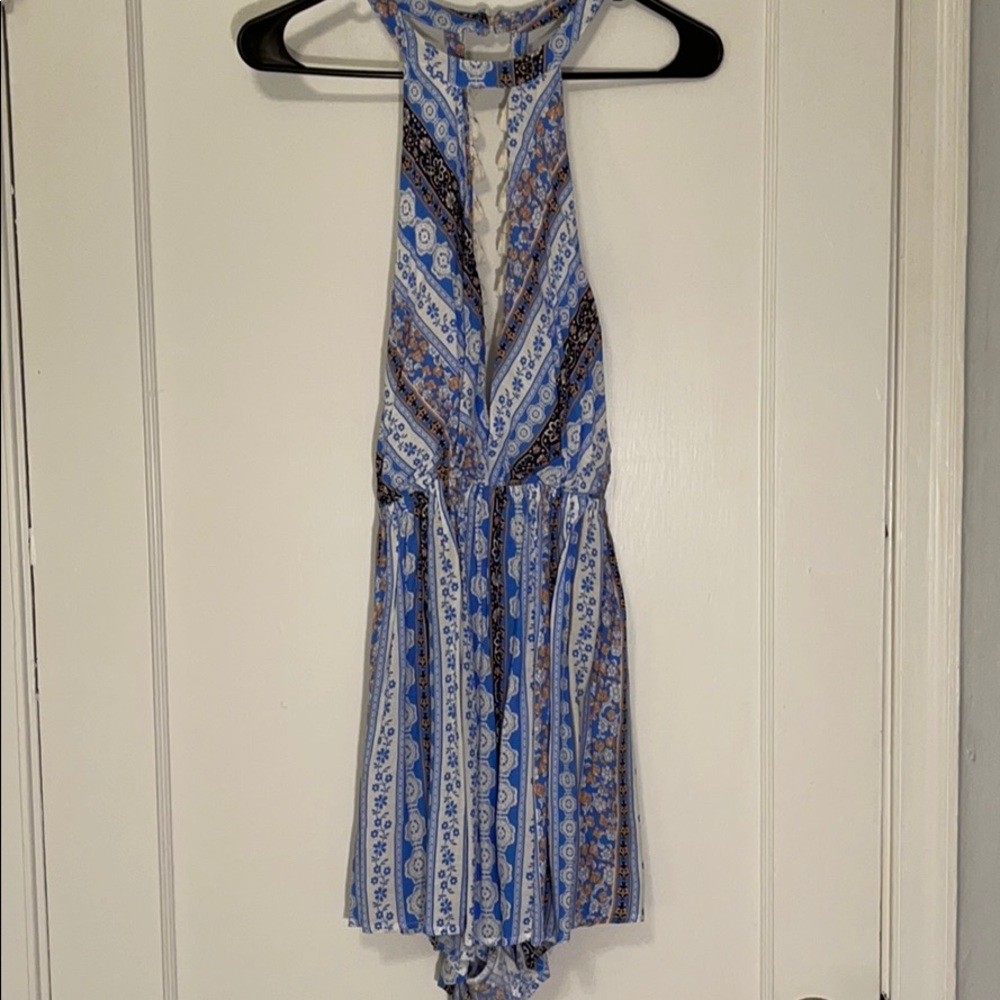 Deep V blue romper and open back
